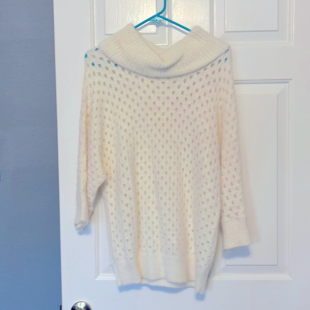 Lauren Michelle Cream colored cowl neck sweater.